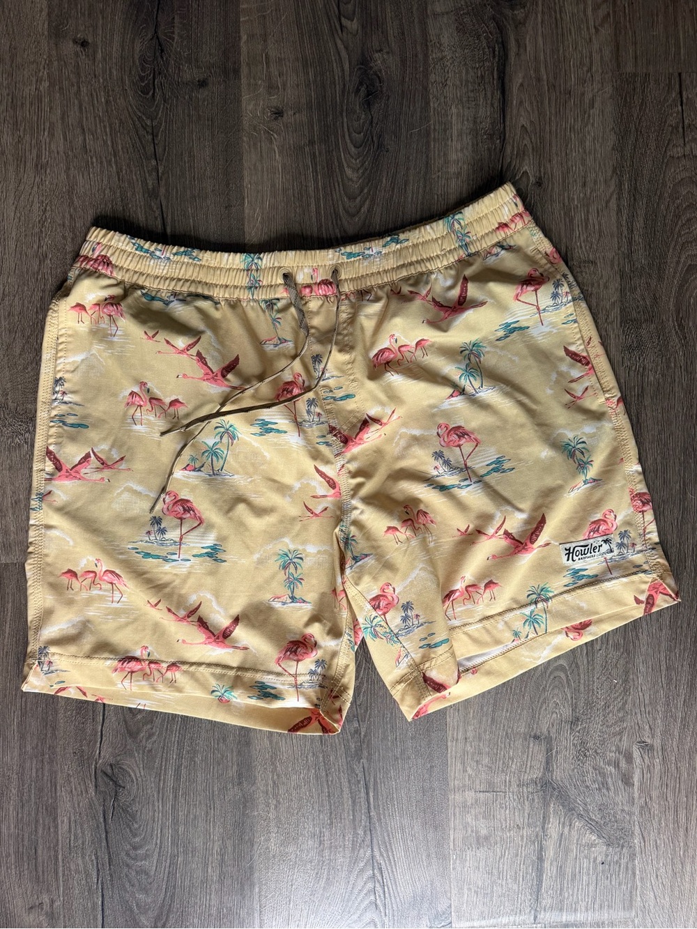 Howler Brothers Yellow Swim Trunks with Pink Flamingo Print